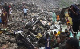 At least 30 killed after landslide tears through rubbish landfill in Guinea