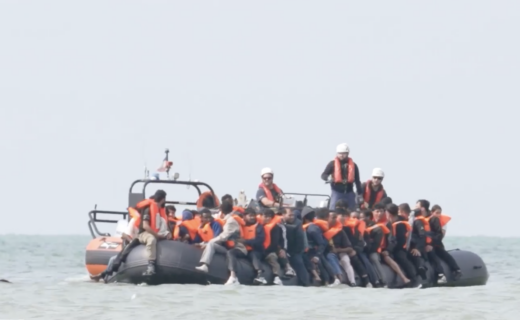 Mega dinghy carrying NEW RECORD number of illegal migrants reaches Britain as 230 cross Channel