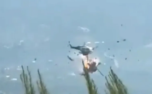 Two helicopters crash mid-air while tackling wildfires in Greece as more than 100 homes destroyed