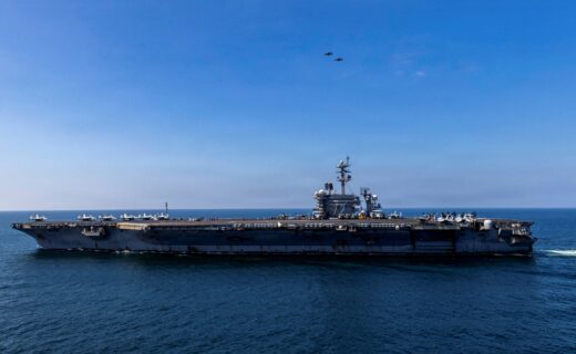 US Navy warship visited by top admiral as 'sailors jump overboard'