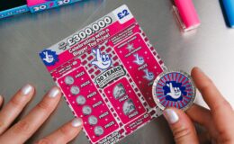 Mother scoops £300,000 on National Lottery scratchcard — and treats herself to new towels