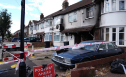 Fire at London property leaves woman dead and eight others injured as police make arrest
