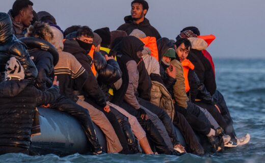 Mega-dinghy carrying dozens of illegal migrants catches fire while crossing Channel