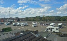 Travellers return to popular beach car park for second time as council launches bid to move them on