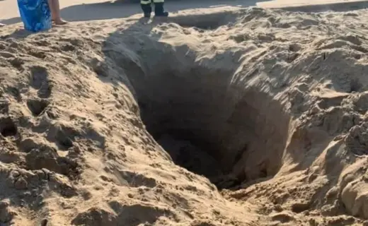 Britons ordered to stop digging big holes at the beach over 'risk of death' during summer holidays