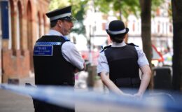 Two men arrested and two police officers injured after 'crowd invades asylum-linked houses' in Norfolk