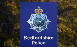 Police shoot knifeman four times after he stabbed a woman in broad daylight in Luton
