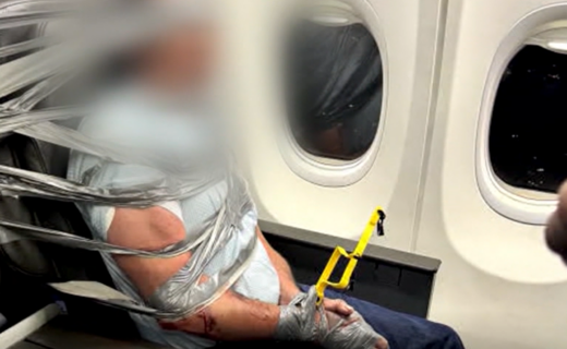 'Violent' passenger duct-taped to seat after 'choking' fellow traveller on board chaotic flight