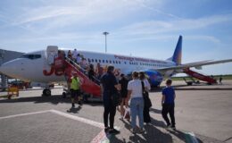 Britons face flight price hikes of up to £400 as Net Zero drive threatens to price families out of holidays abroad