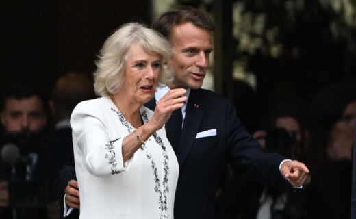 Emmanuel Macron spotted placing hand on Queen Camilla's back at British Museum